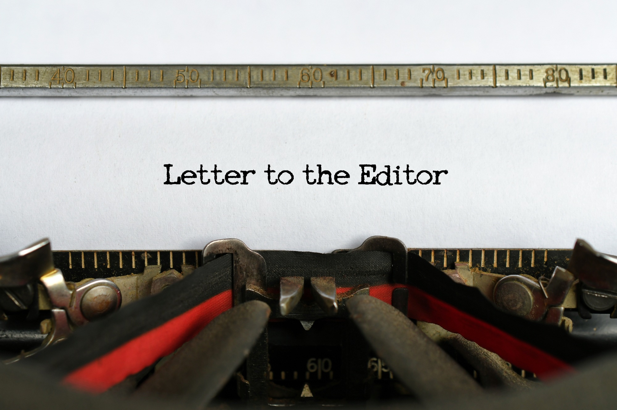 Letter to the Editor words typed on a sheet of paper in a vintage typewriter, concept